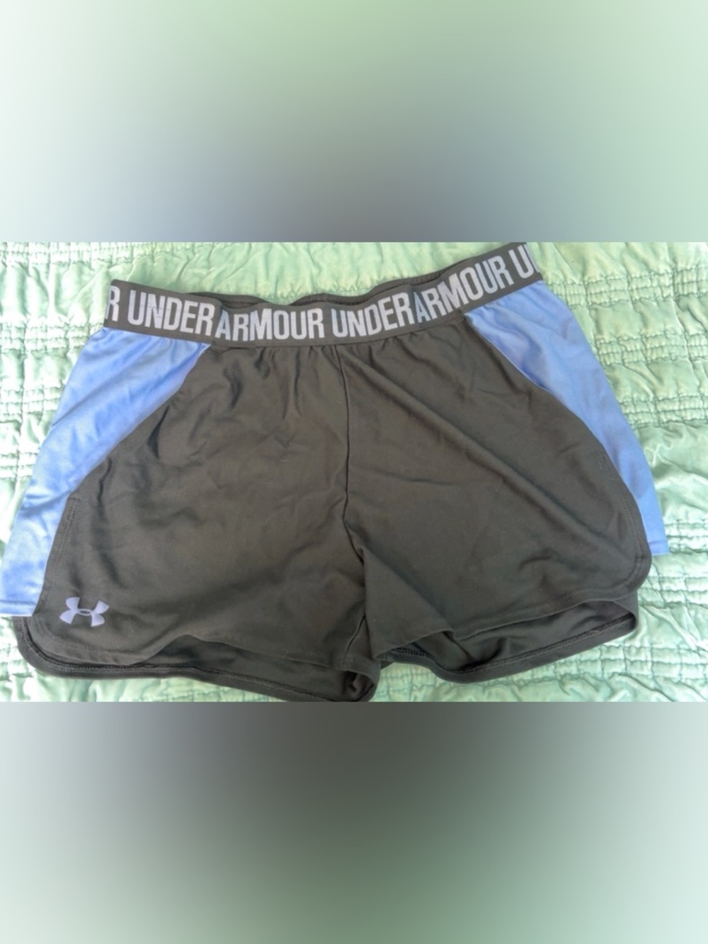 Under Armour Black Athletic Shorts with purple side panels.